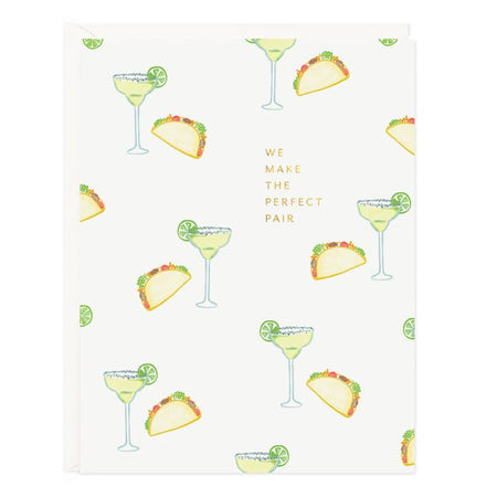 White card with images of tacos and margaritas.  Gold foil text saying, “We Make the Perfect Pair”. A white envelope is included.