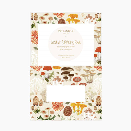 Ivory lined paper with border images of mushrooms, pinecones and fluffy flowers. Ivory envelopes with images of mushrooms, pinecones and fluffy flowers.