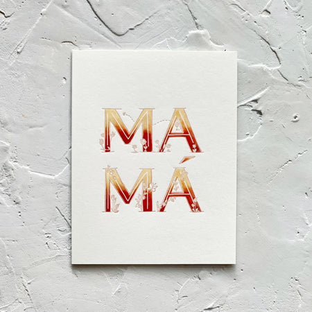 Ivory card with variegated color text in orange, red, and white saying, “MAMA”. Images of embossed flowers. A gray envelope is included.