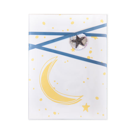 White paper with yellow stars, moons and circles.