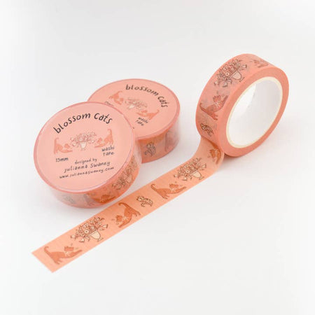 Pink washi tape with images of pink cats and white vases holding white and pink flowers.