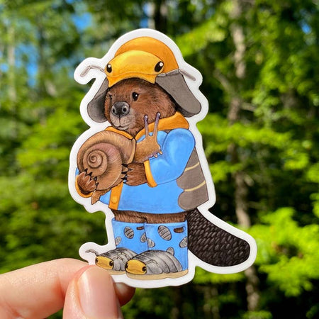 Sticker in the image of a beaver wearing a yellow rain hat, blue slug boots. Beaver is holding a brown snail.