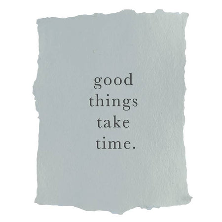 Art print on gray paper with black text saying, “Good Things Take Time”.