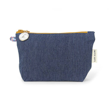 Rectangular travel pouch with blue denim design. Yellow zipper across the top.