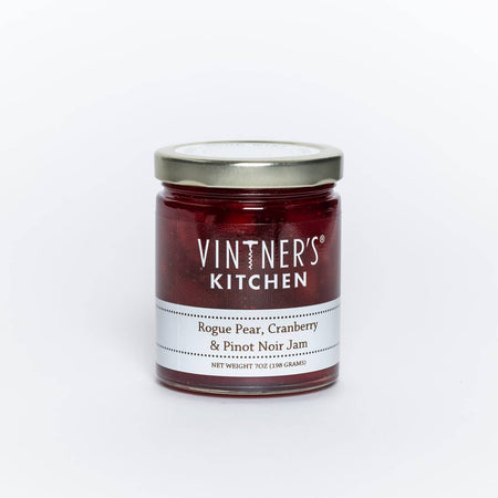 Glass jar with metal lid. White text saying, “Vintner’s Kitchen Pear, Cranberry & Pinot Noir Jam”.