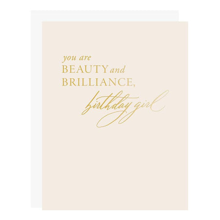 Cream card with gold text saying, “You are beauty and brilliance, birthday girl”. A white envelope is included.