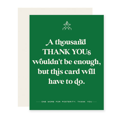 Green background with white text saying, ”A thousand thank yous wouldn’t be enough, but this card will have to do”. Image of a white pair of praying hands in top center. A cream colored envelope is included.