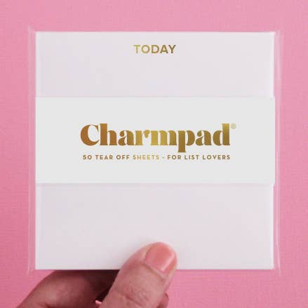 White square notepad with gold foil text saying, “TODAY” in top center.