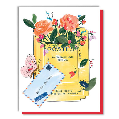 White card with images of a yellow vintage mailbox with flowers and a butterfly coming out of it and an airmail envelope in front. Black text saying, “For a Beautiful Friend”.  A red envelope is included.