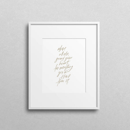 Art print on white background with tan text saying, “Above all else, guard your heart, for everything you do flows from it.”