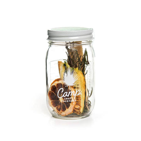 Cocktail jar with dried orange, lemon and rosemary.