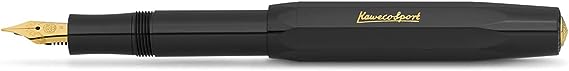 Black pen with brass nib tip.