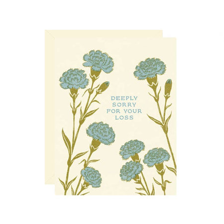 Off white card with images of blue flowers with green stems. Blue text saying, “Deeply Sorry For Your Los”. A white envelope is included.