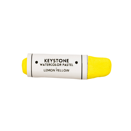 Lemon yellow pastel crayon with white label with black text.