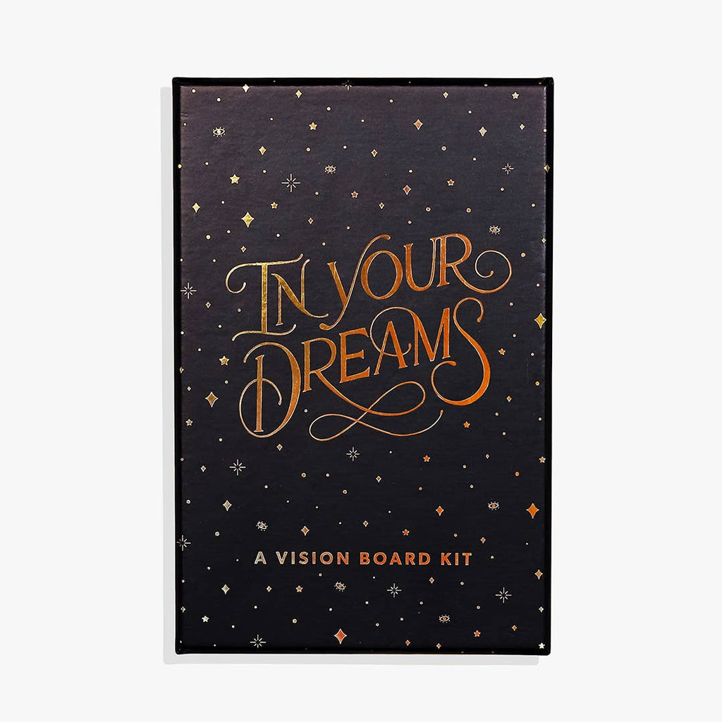 Black cover with gold foil text saying, “In Your Dreams A Vision Board Kit”. Images of gold stars.