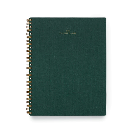 Hunter green cover with gold foil text saying, 