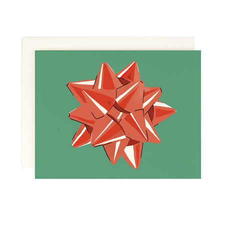 Green card with image of a large red gift bow in center. A white envelope is included. 