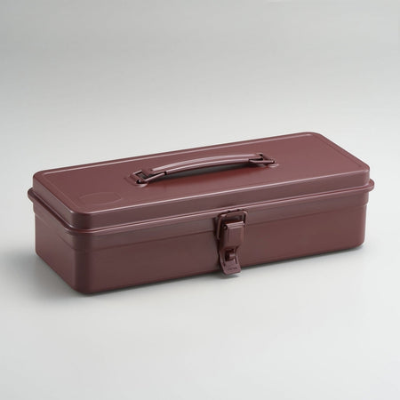 Brown long rectangular steel toolbox with top handle and front latch.