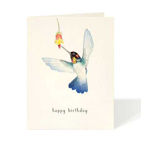 White card with image of a hummingbird and a flower. Black text saying, “Happy Birthday”. A white envelope is included.