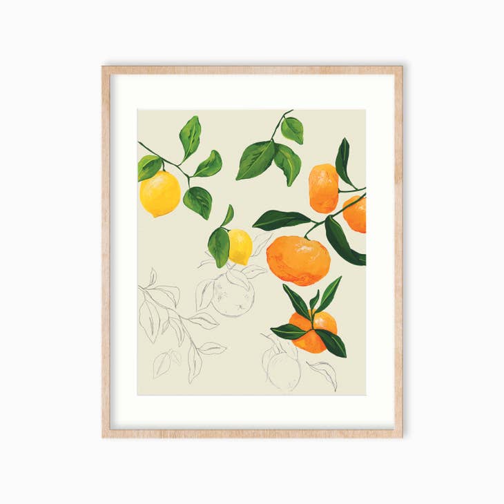 Art print with tan background with yellow lemons and oranges  attached to green leaves.