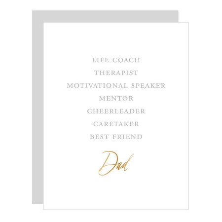 White card with gray and gold text saying, “Life Coach Therapist Motivational Speaker Mentor Cheerleader Caretaker Best Friend Dad”. A gray envelope is included.