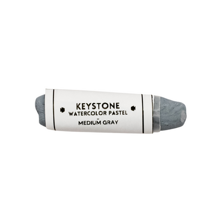Medium gray pastel crayon with white label with black text.