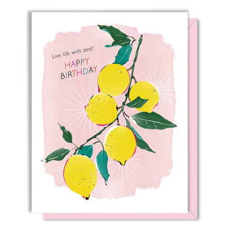 White card with images of lemons on a branch. Text saying, “Live Life with Zest! Happy Birthday”. A pink envelope is included.