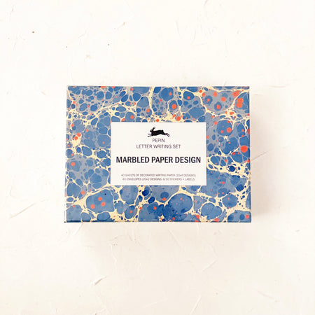 Letter writing set featuring marbled picture, on textured background