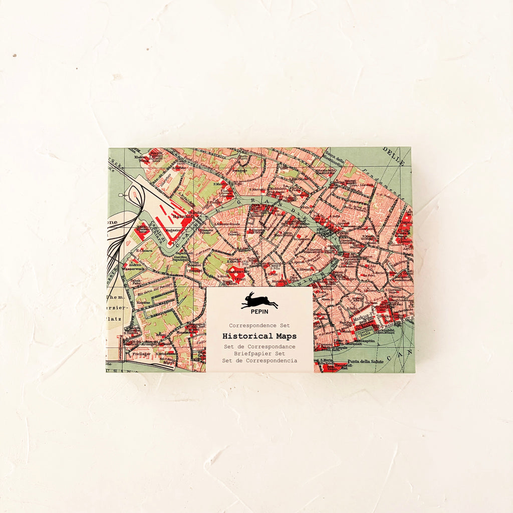 correspondence set box with vintage map on textured background