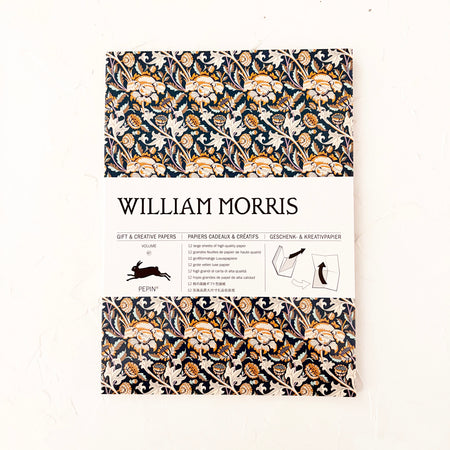 William Morris  creative paper book on textured background