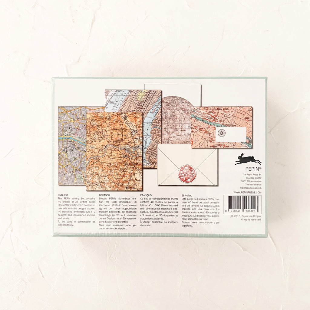 back of letter writing set box on textured background 