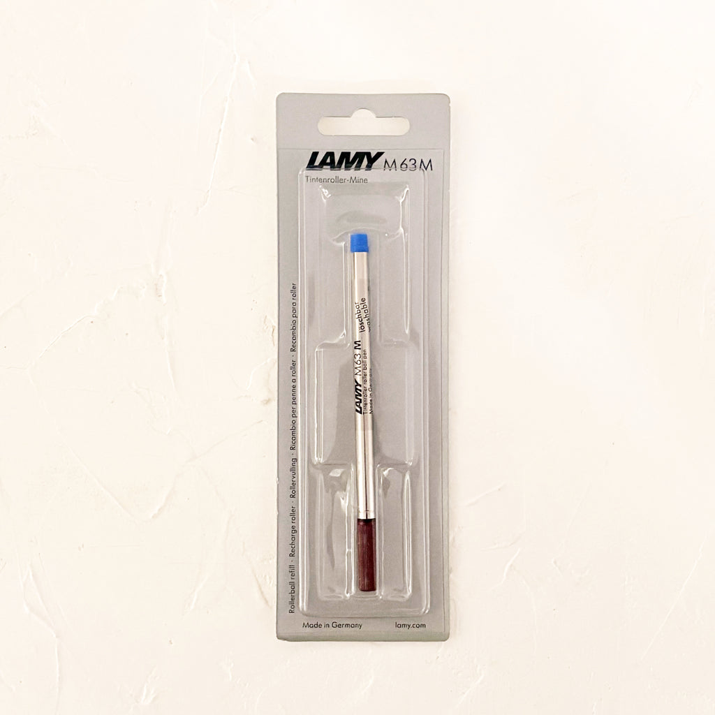 rollerball pen refill on textured background