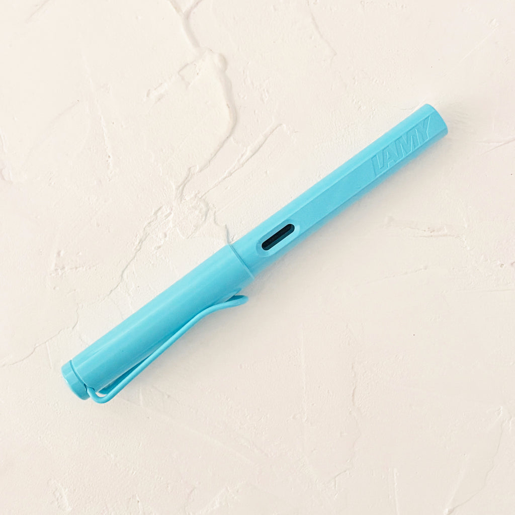 blue pen on textured background