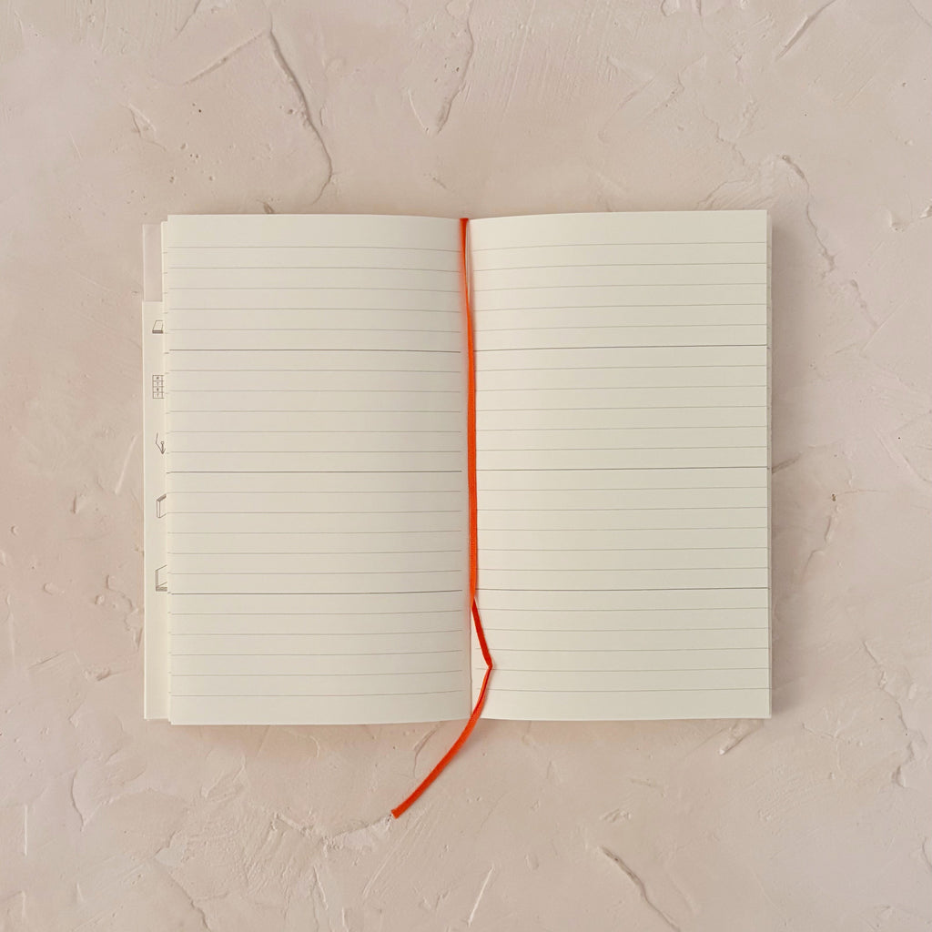 open planner on textured background