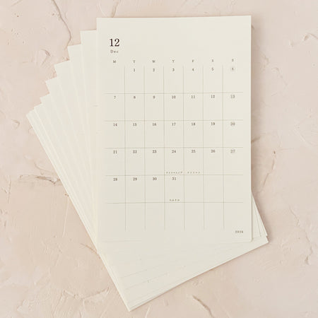 monthly stickers on textured background