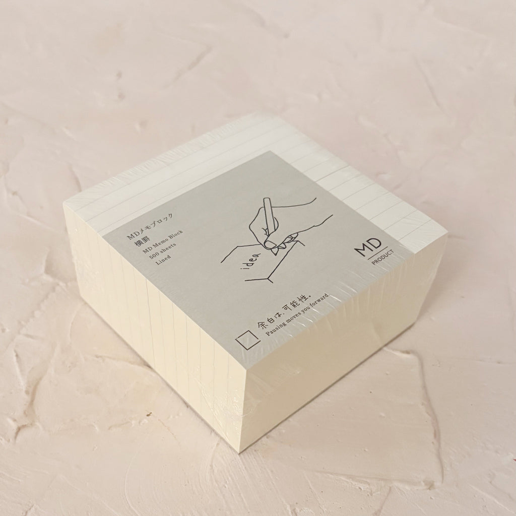 lined memo pad on textured background