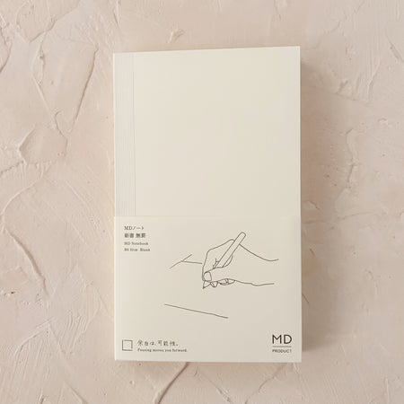 b6 slim notebook on textured background