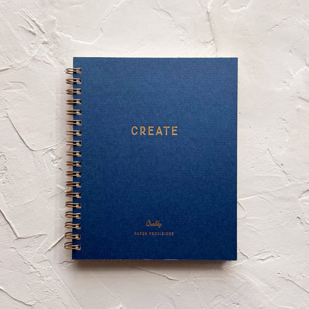 Blue notebook on textured background