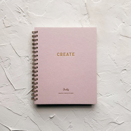 Lilac notebook on textured notebook