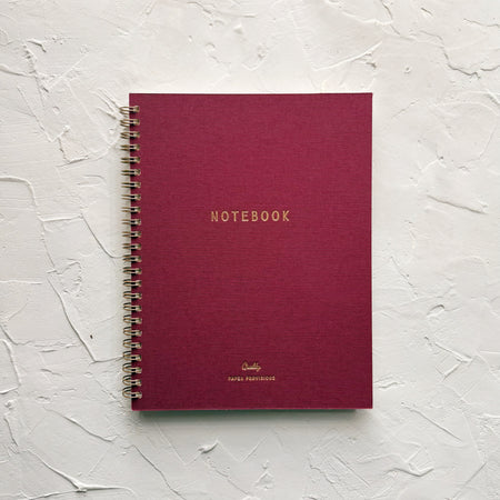 Mulberry notebook on textured background