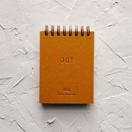 Saffron Jotter on textured background