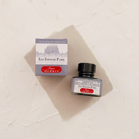 Ink bottle labeled 