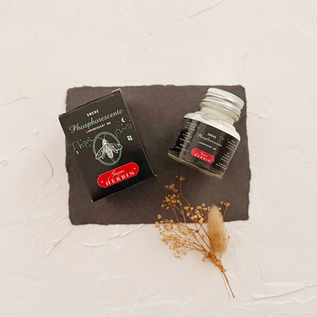 Ink bottle labeled 