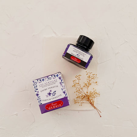 Ink bottle labeled 