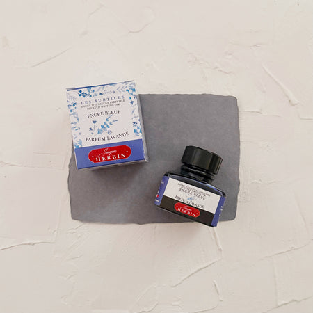 Ink bottle labeled 