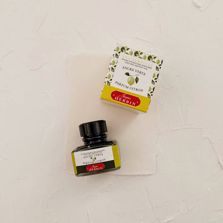 Ink bottle labeled 