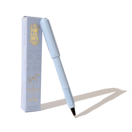 Light blue pen with black and silver tip. Light blue cap. Packaged in blue box with gold text saying, “Ferris Wheel Press” with image of a carousel horse.