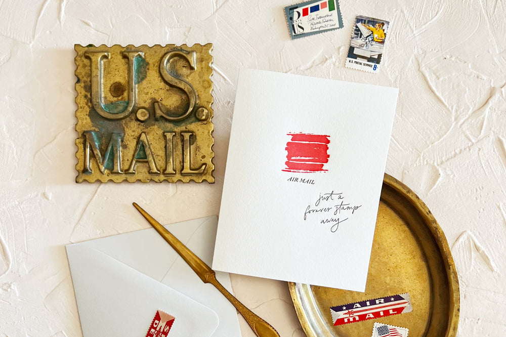 greeting card that says air mail featuring a paint swatch design