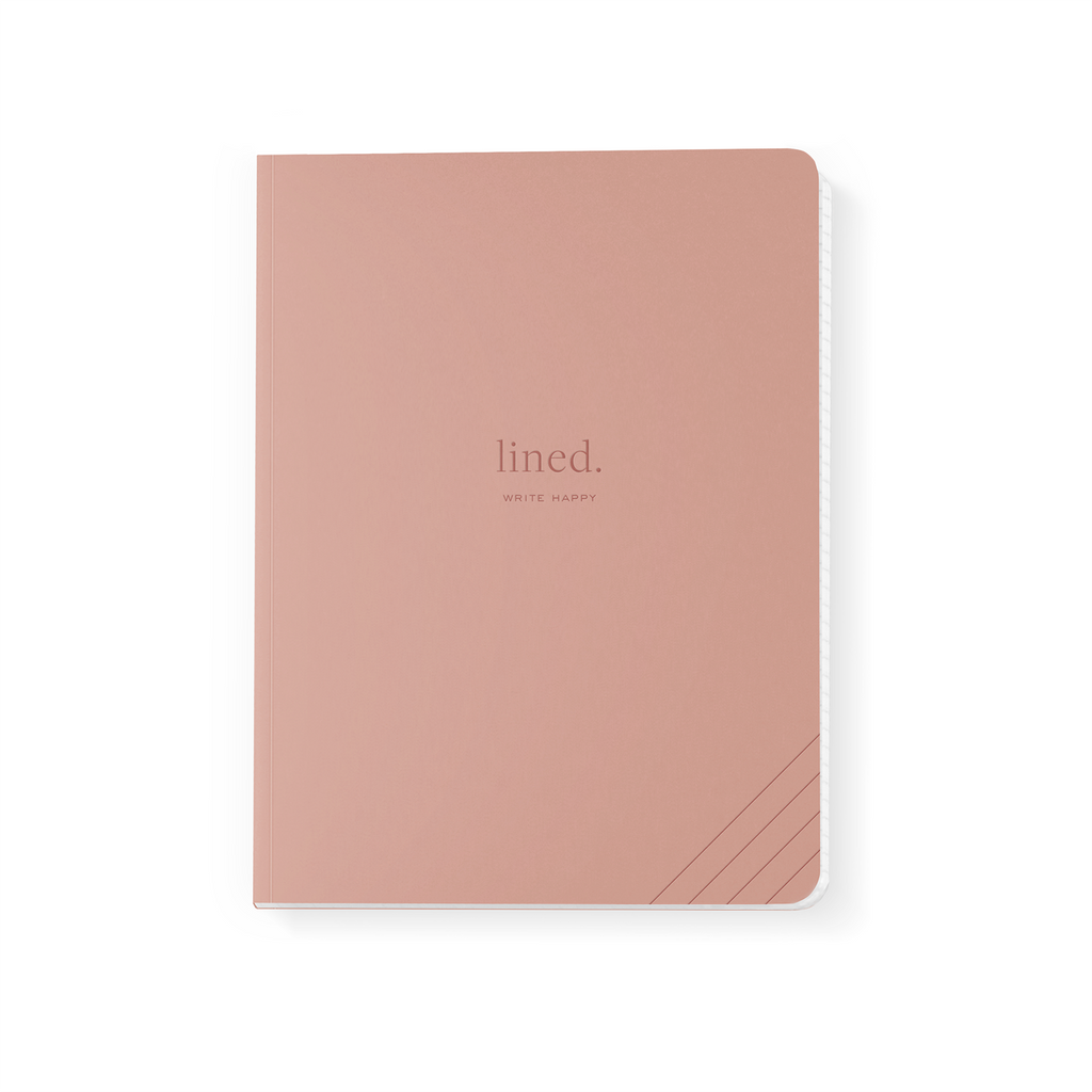  Pink cover with gold foil text saying, “Lined”.