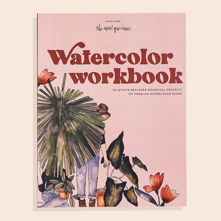 Pink cover with red text saying, “Watercolor Workbook”. Images of a woman tending to green and red plants.